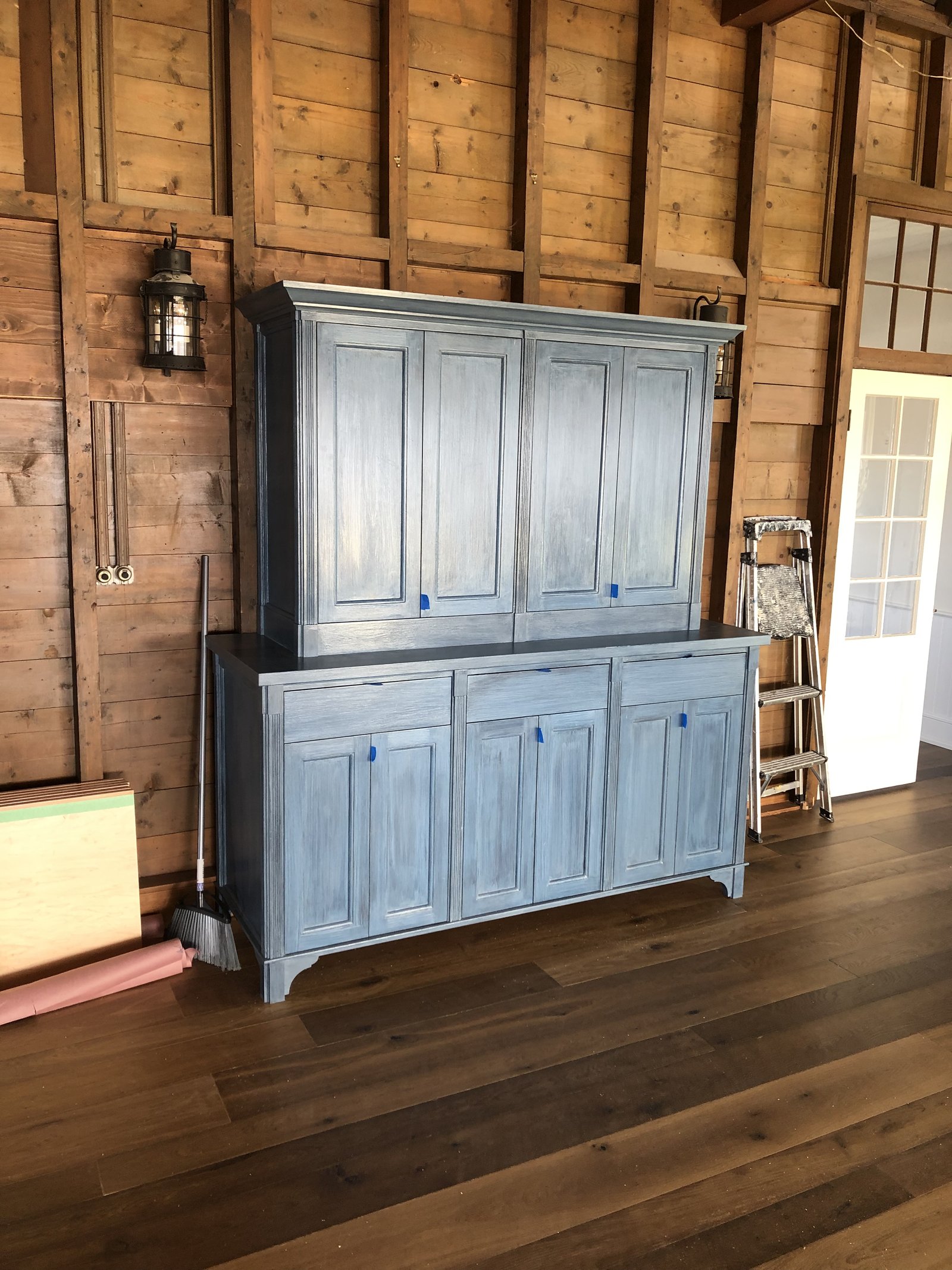 Custom blue hutch cabinet installed in Nantucket ballroom
