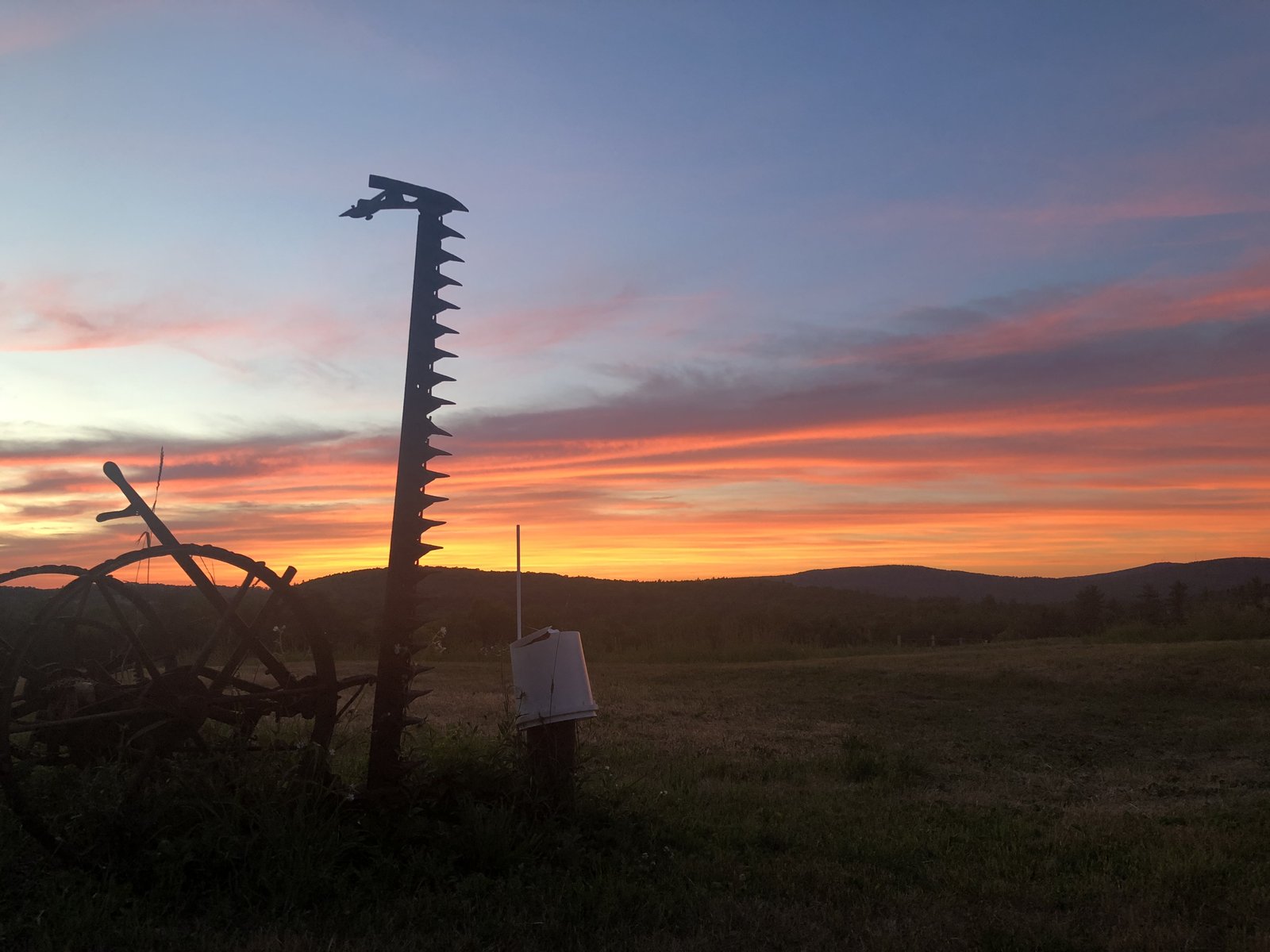Farm tools at sunset in Maine — Jesse Smith's roots