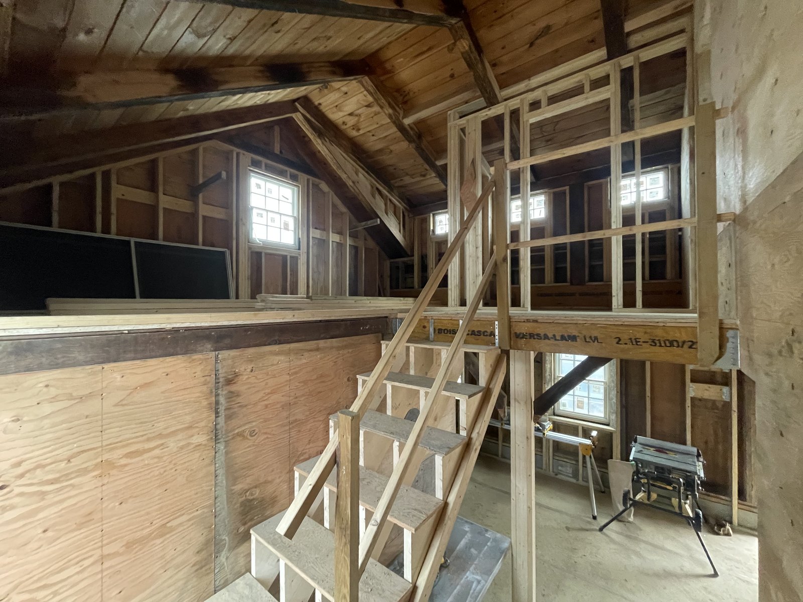 Staircase framing and structural carpentry in progress