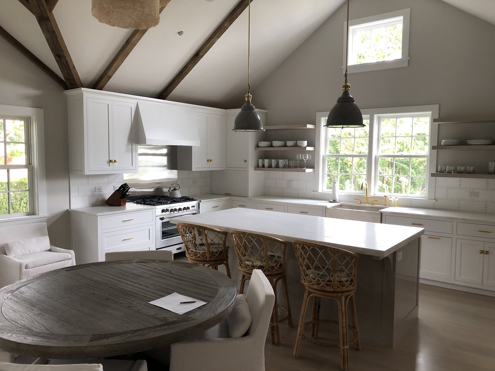 Nantucket cottage kitchen with brass hardware and farmhouse sink — Smith & Company craftsmanship